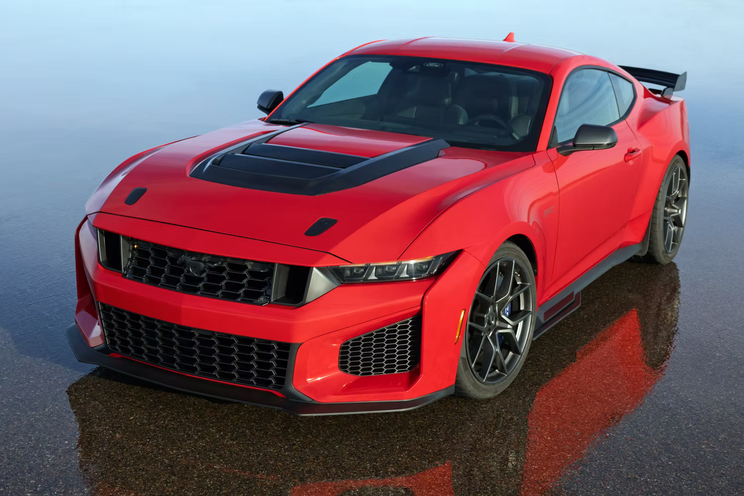 2026 Ford Mustang Dark Horse SC in red. High angle front three-quarter static image