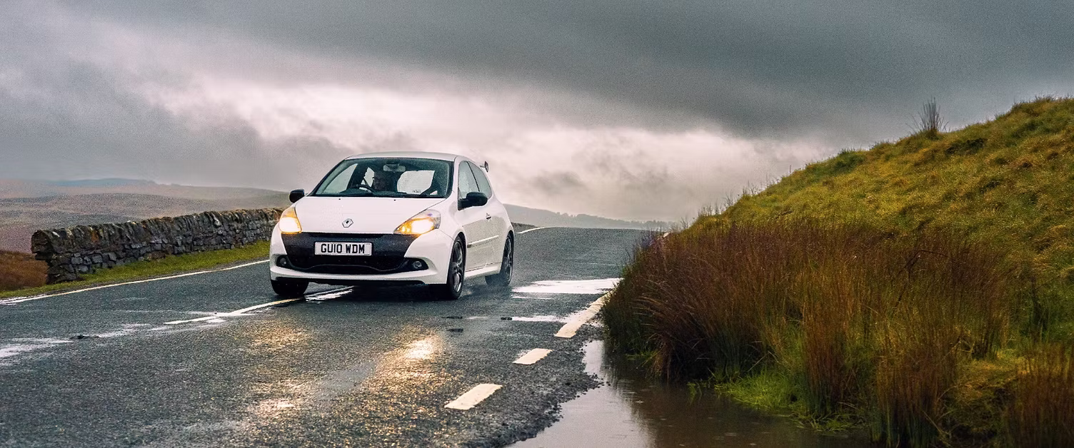 White Renault Clio 200