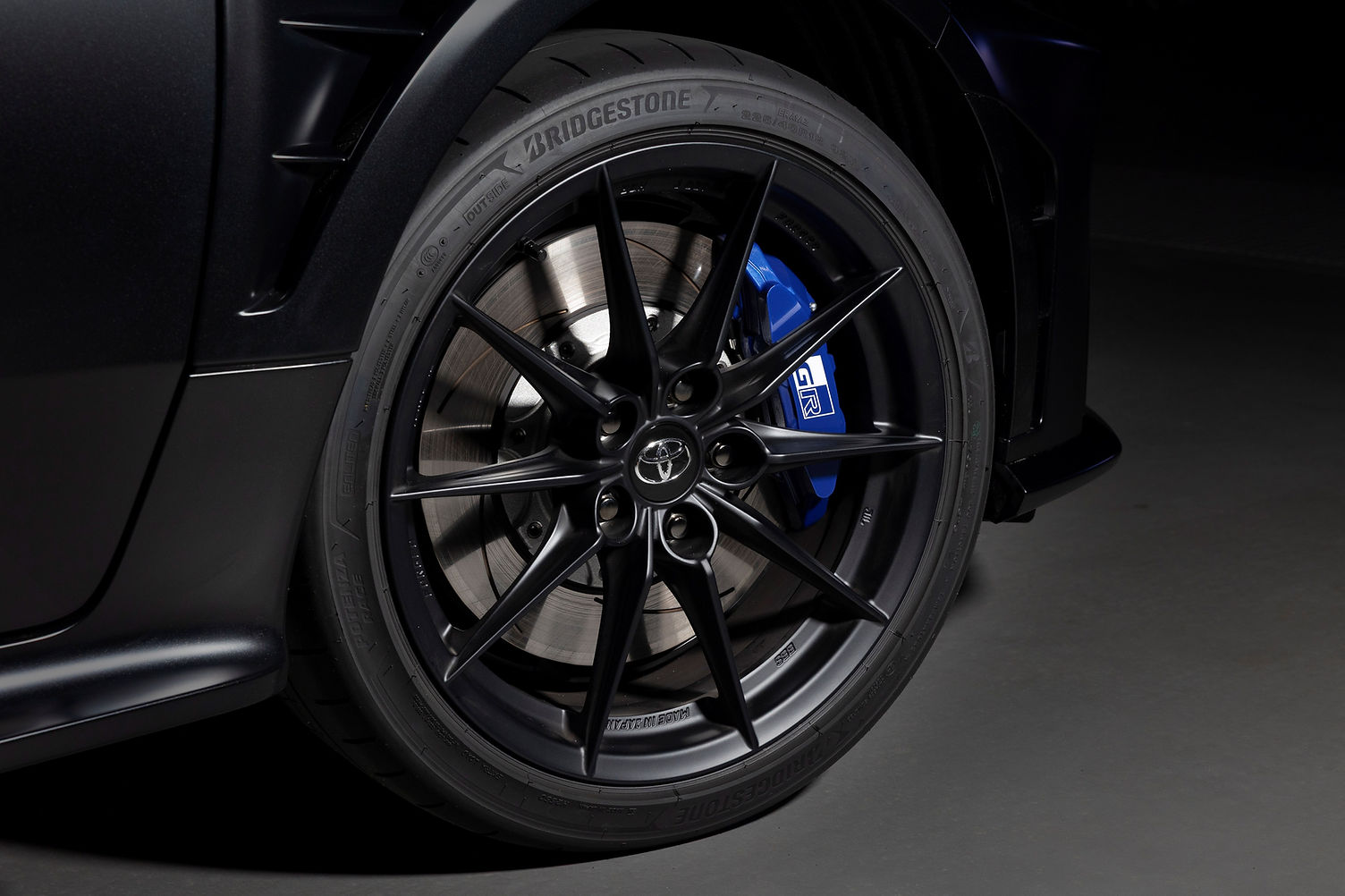 Matte black forged magnesium wheel with Ogier signature blue brake calliper