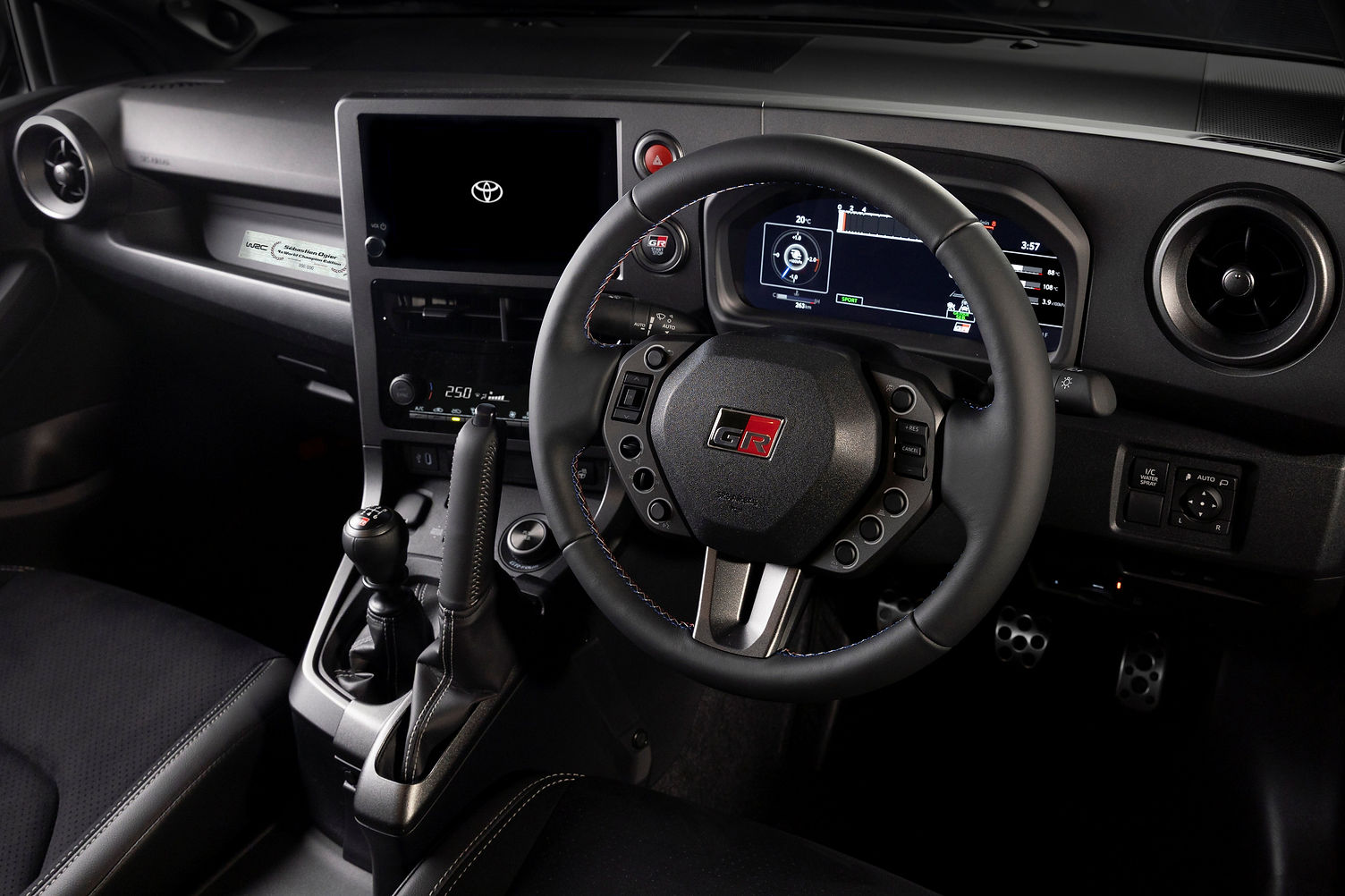 GR Yaris Ogier 9x interior with Rally2-derived steering wheel and vertical handbrake