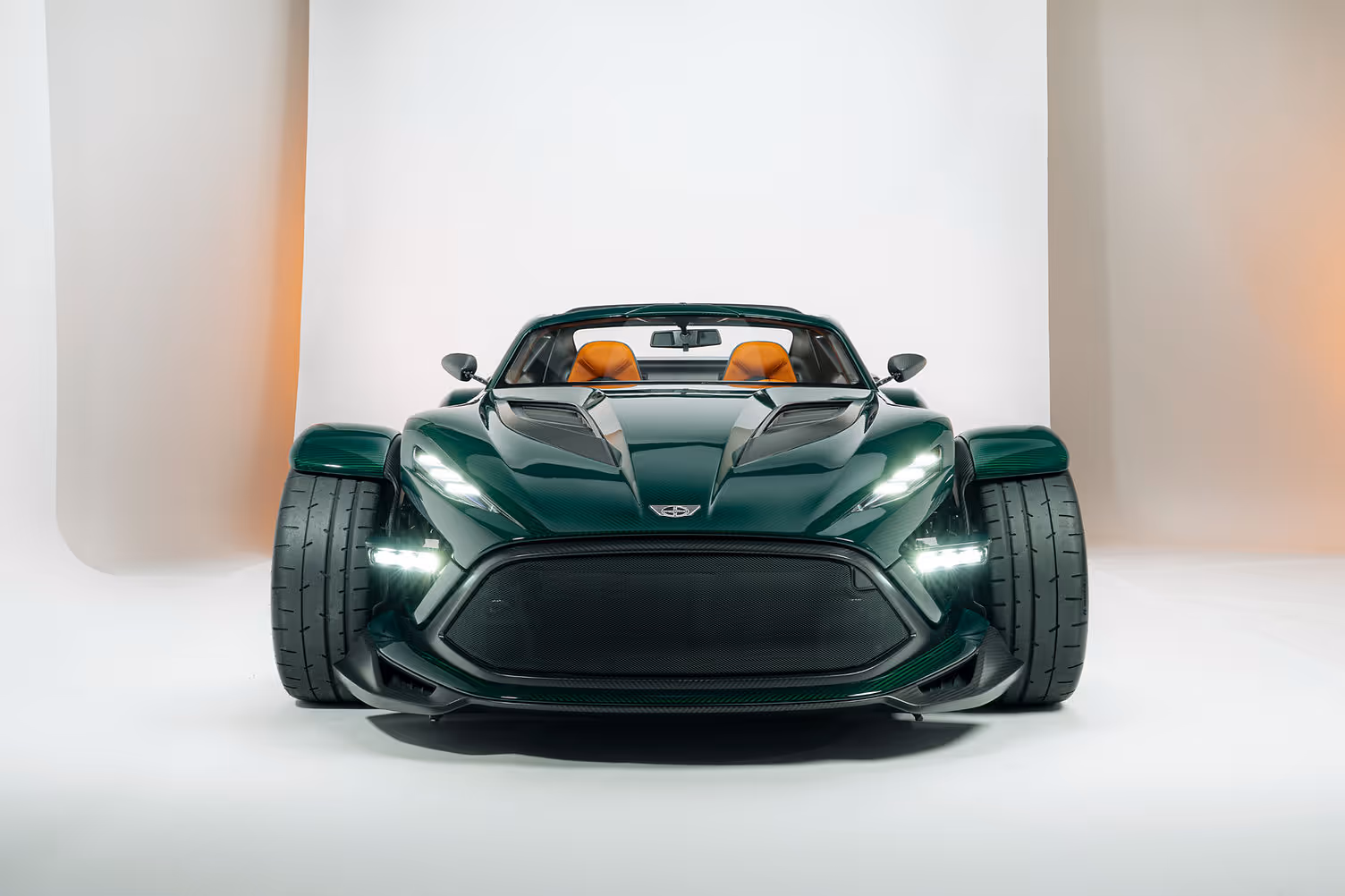 Donkervoort P24 RS front view showing exposed front wheels and swing-out Aero Blade headlights