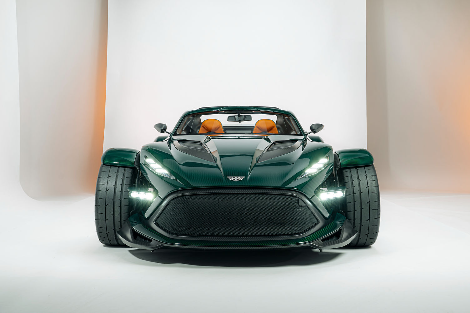 Donkervoort P24 RS front view showing exposed front wheels and swing-out Aero Blade headlights