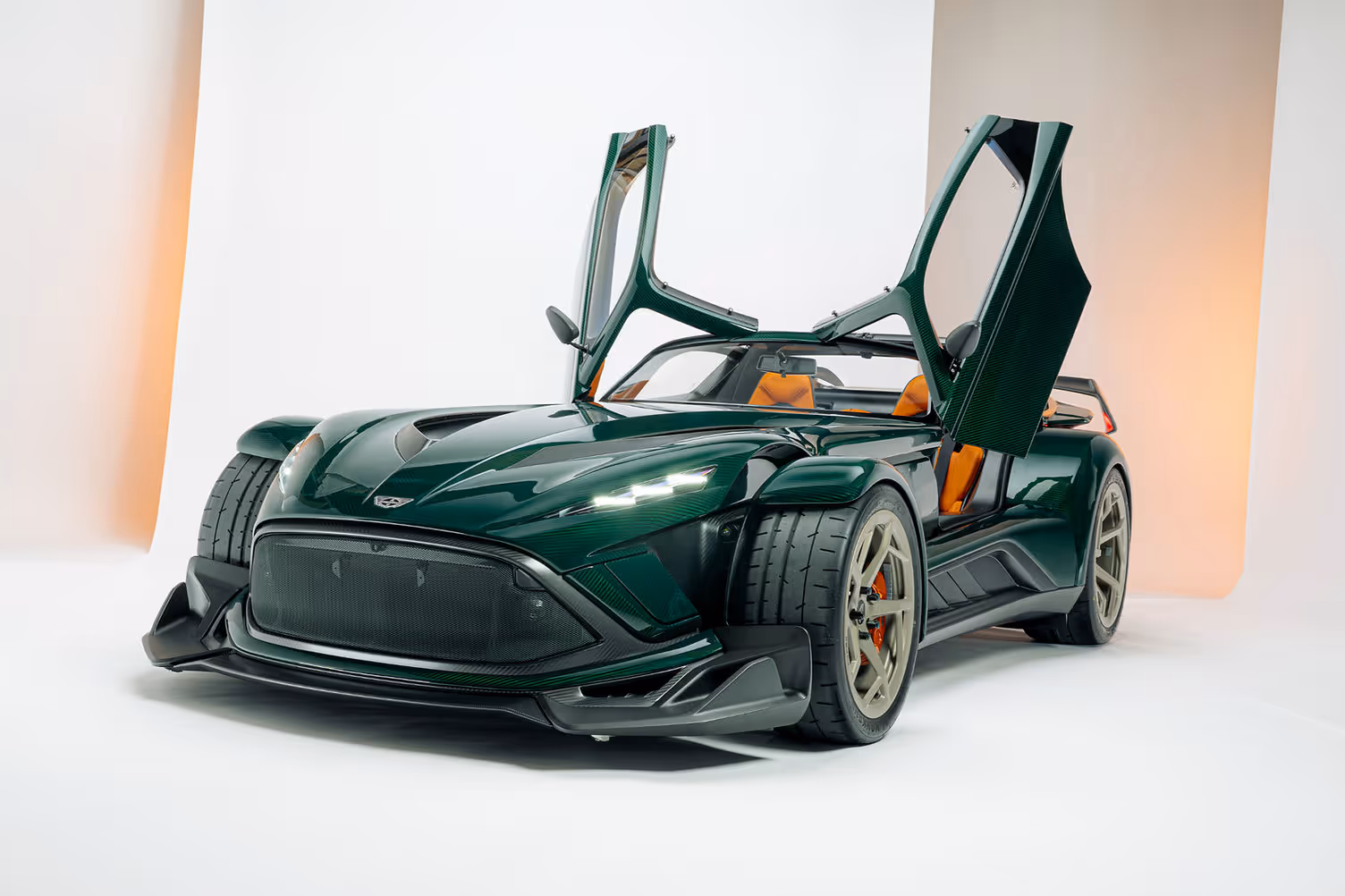 Donkervoort P24 RS with butterfly doors open showing interior and optional aero package