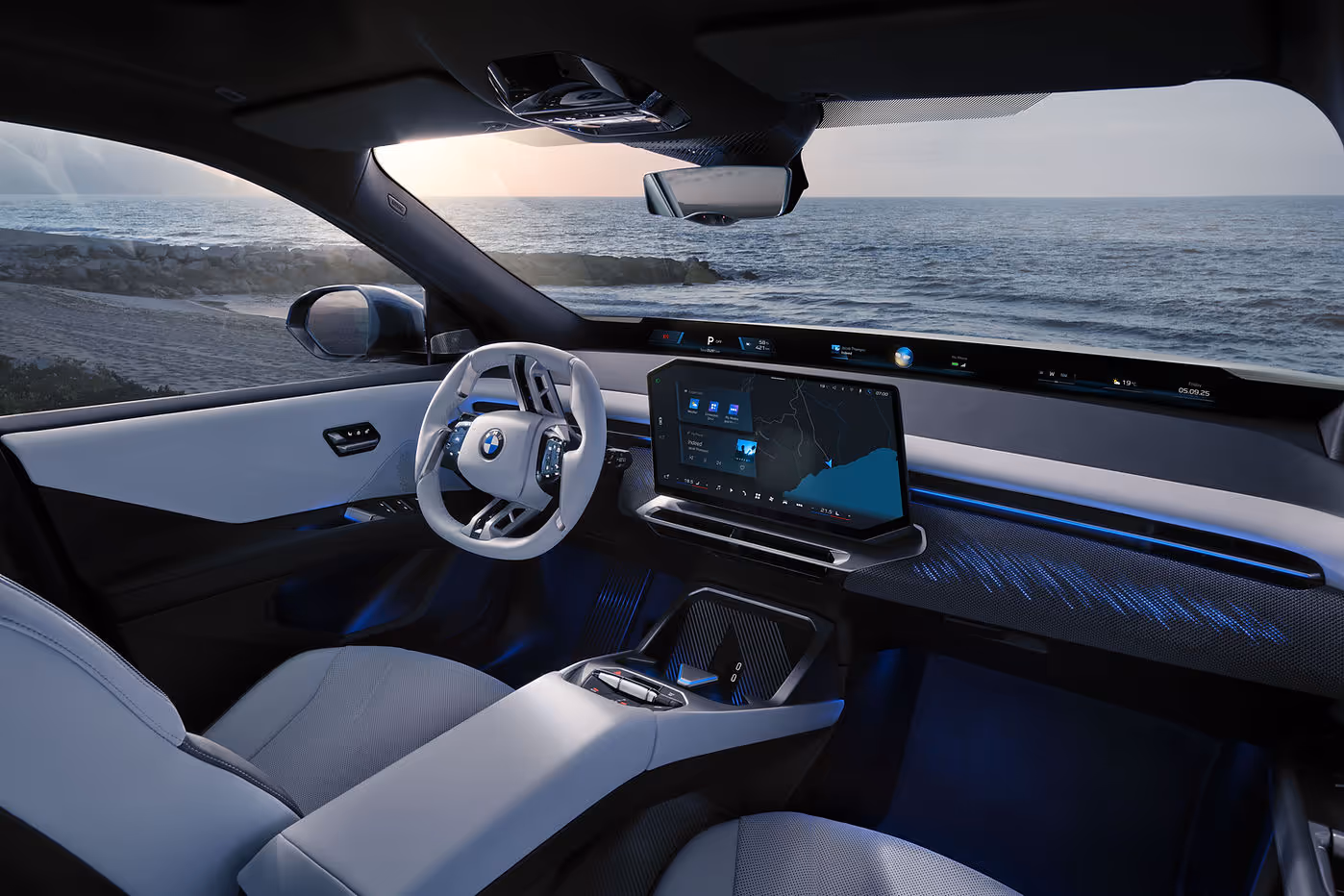 Interior of the BMW iX3 showing the panoramic HUD display, hexagonal infotainment screen angled toward the driver, and sculpted two-spoke steering wheel.