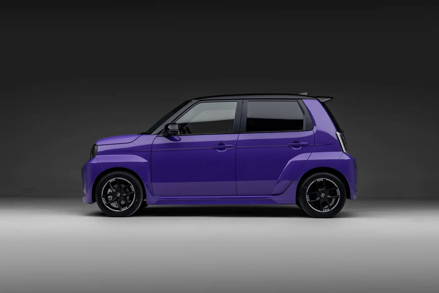 Honda Super-N: City Turbo II's Electric Heir Heads to the UK - side profile view of purple concept car, neutral studio setting