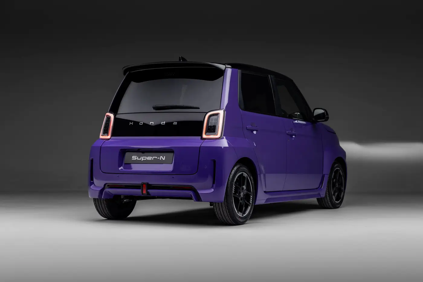 Honda Super-N: City Turbo II's Electric Heir Heads to the UK - rear three quarter view of purple concept car, neutral studio setting
