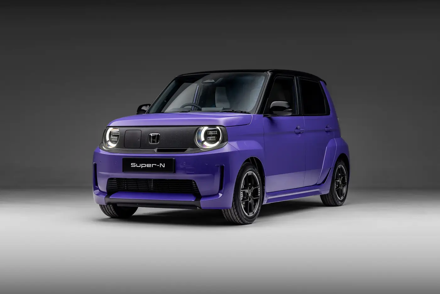 Honda Super-N: City Turbo II's Electric Heir Heads to the UK - front three quarter view of purple concept car, neutral studio setting