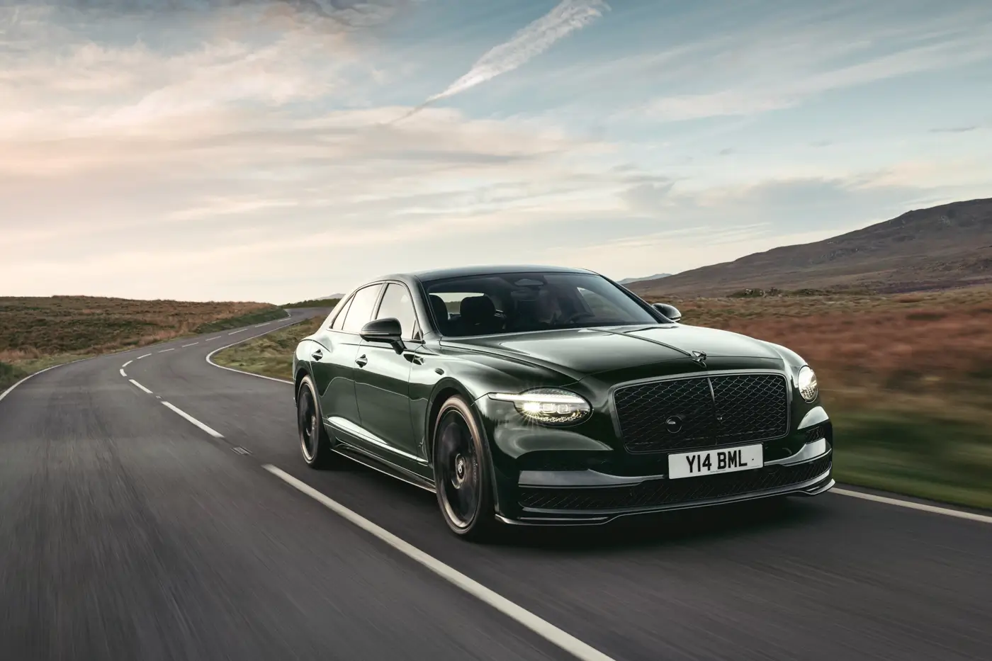 2026 Bentley Flying Spur S front three-quarter on moorland road