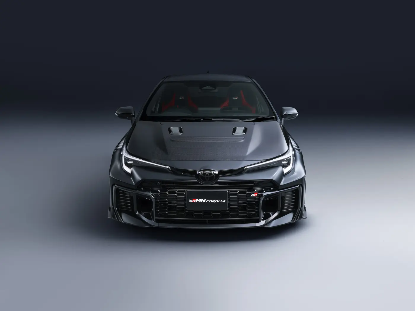 Toyota GRMN Corolla front elevation showing bonnet vents and GRMN badging