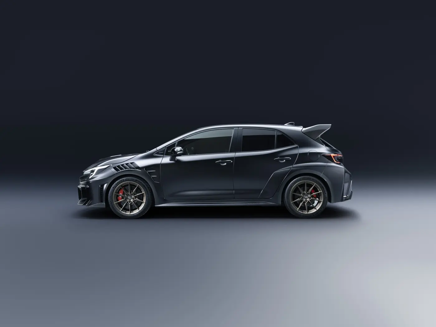 Toyota GRMN Corolla side profile showing louvred front wings and bronze forged wheels