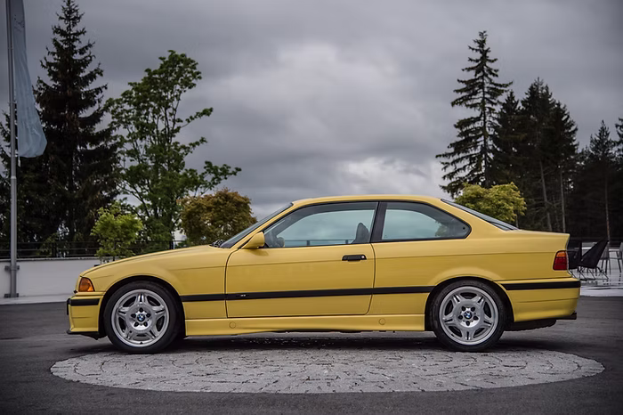 E36 M3 3.0 Dakar Yellow side profile