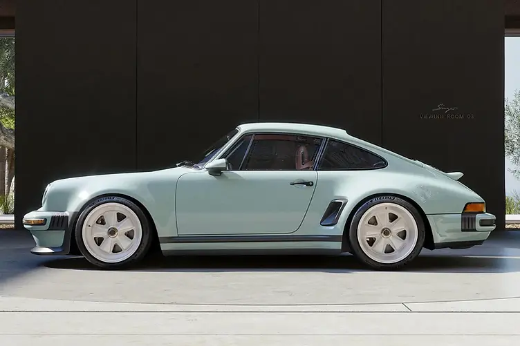 Singer's latest reimagined 911 blends wide-body '80s looks with a 4.0L VVT flat-six, hybrid cooling, and F1-grade chassis tech from Red Bull. Side profile