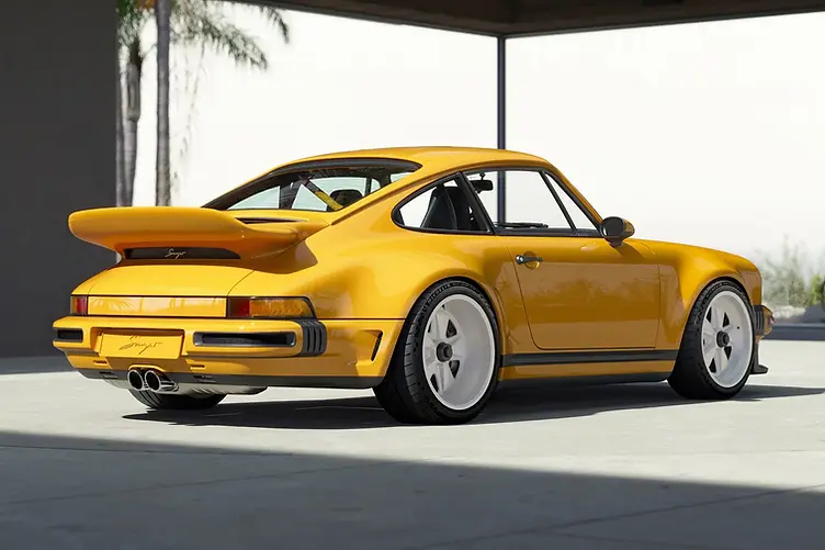 Singer's latest reimagined 911 blends wide-body '80s looks with a 4.0L VVT flat-six, hybrid cooling, and F1-grade chassis tech from Red Bull.