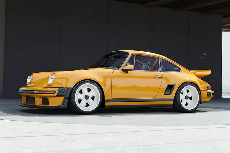 Singer's latest reimagined 911 blends wide-body '80s looks with a 4.0L VVT flat-six, hybrid cooling, and F1-grade chassis tech from Red Bull.