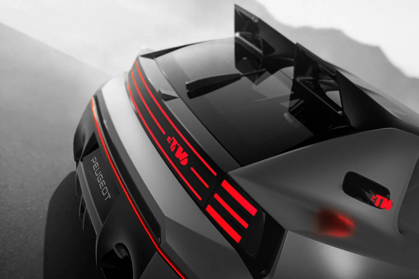 Overhead detail of the Peugeot E-T16 Concept's rear light bars and split rear wing.