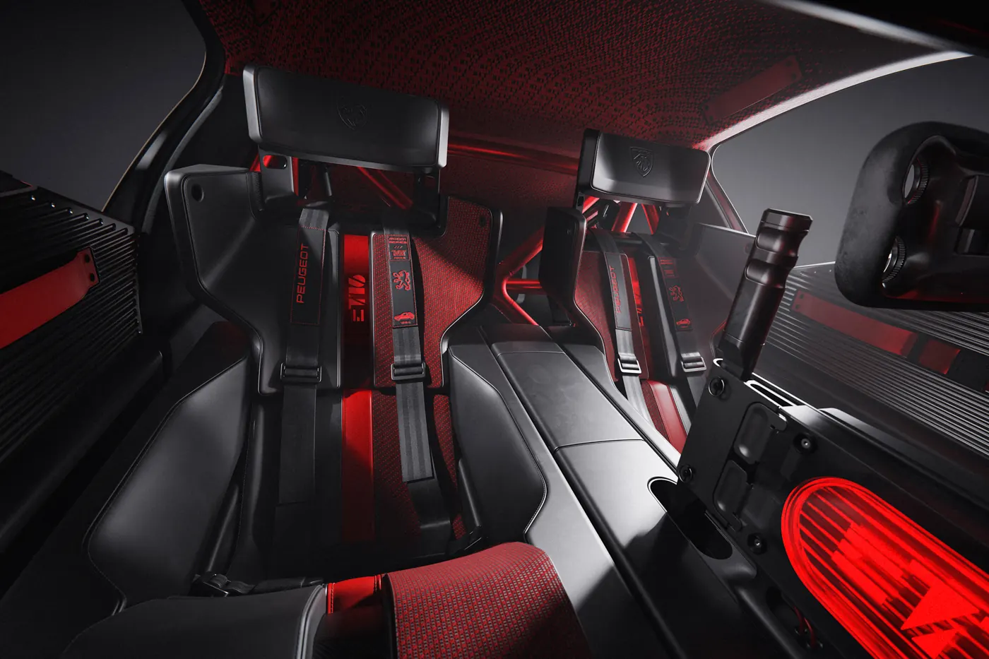 Peugeot E-T16 Concept interior, with carbon-shell bucket seats, four-point harnesses, a red roll cage and a vertical hydraulic handbrake.