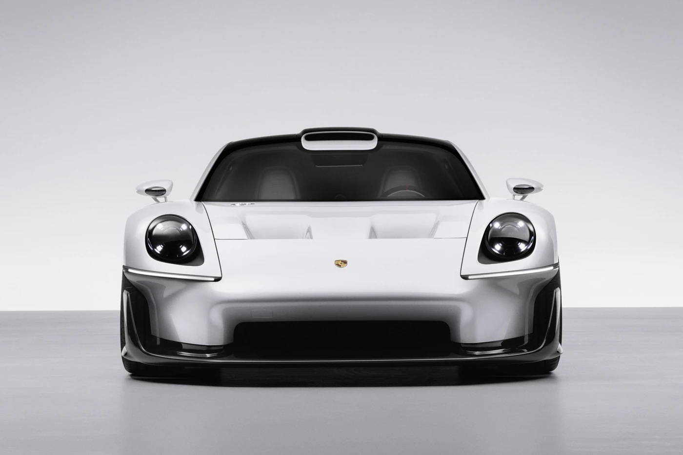 Porsche Mission S concept head-on, with round headlights, roof scoop and Porsche crest on the bonnet
