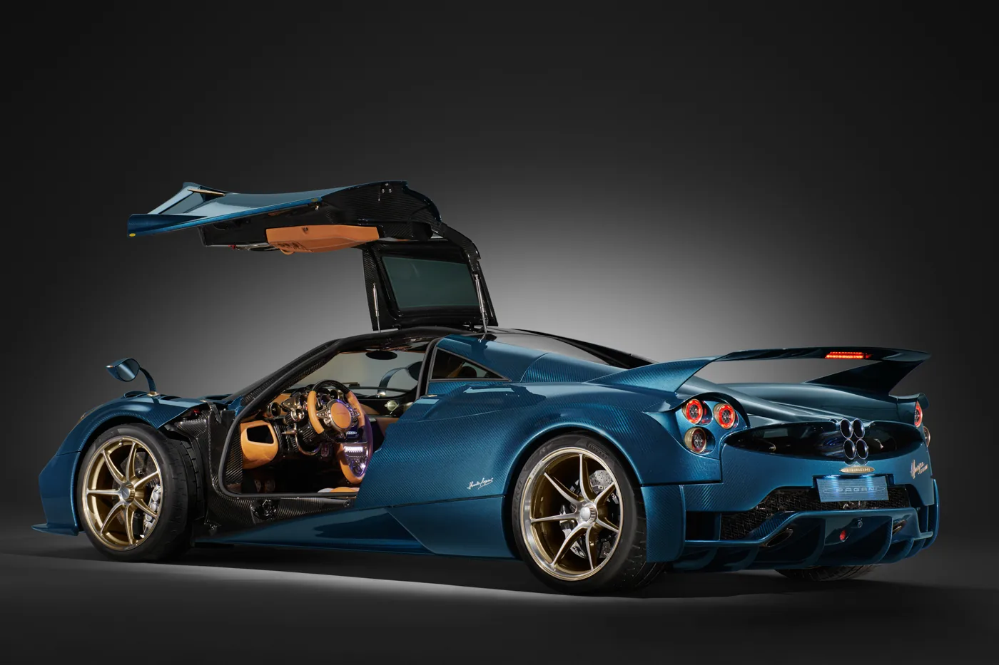 Pagani Huayra Epitome with the driver’s gullwing door open, showing the tan leather interior