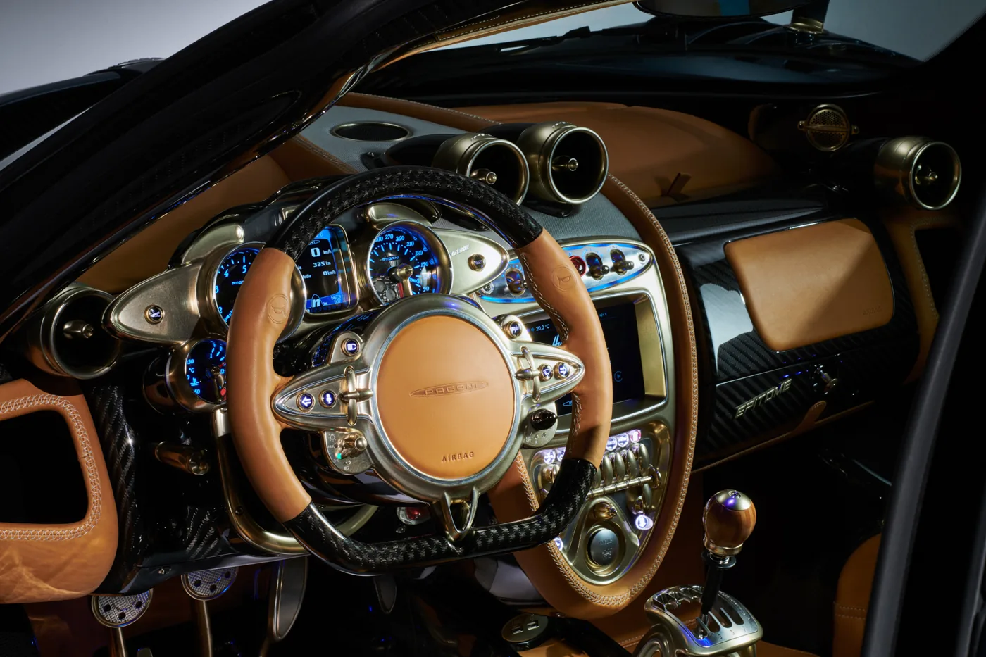 Pagani Huayra Epitome steering wheel and dials in tan leather, carbon fibre and machined aluminium