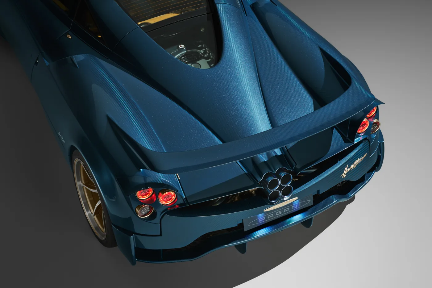 Overhead view of the Pagani Huayra Epitome’s rear hood, integrated wing and quad exhaust