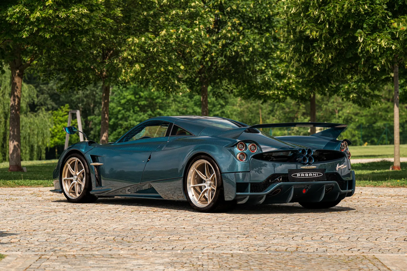 Pagani Huayra Epitome rear three-quarter view, showing the integrated wing and six-pipe exhaust