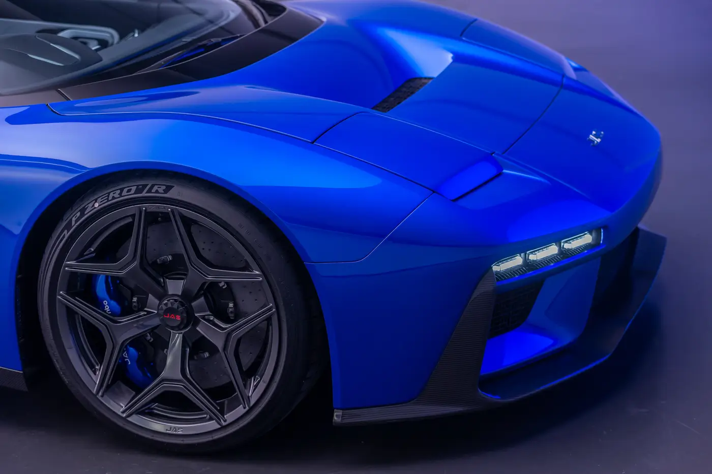 JAS Tensei: revised front profile close up, metallic blue studio setting