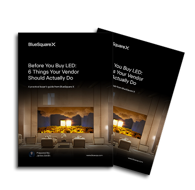 Three overlapping brochures titled 'Before You Buy LED: 6 Things Your Vendor Should Actually Do' with an image of a warmly lit outdoor patio and city skyline at dusk.