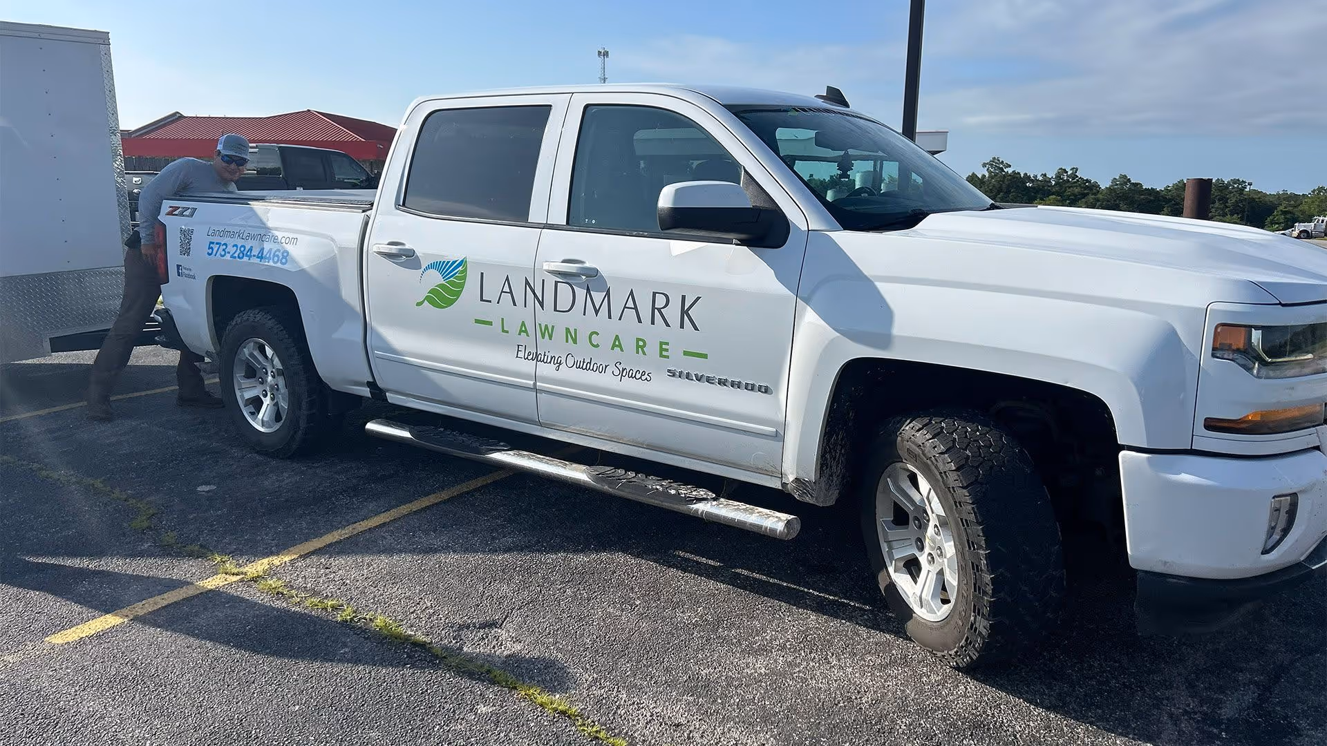 Landmark Lawncare team providing professional lawn and landscaping services in Lake of the Ozarks Missouri