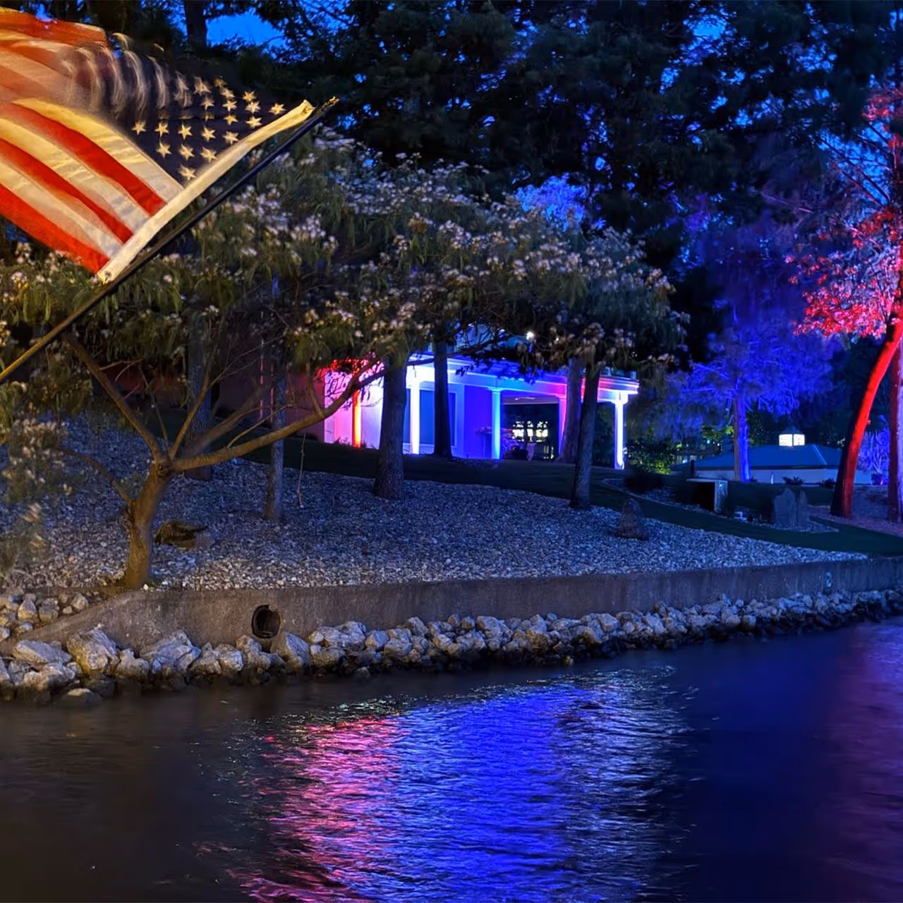 outdoor landscape lighting installation by Landmark Lawncare in Lake of the Ozarks Missouri