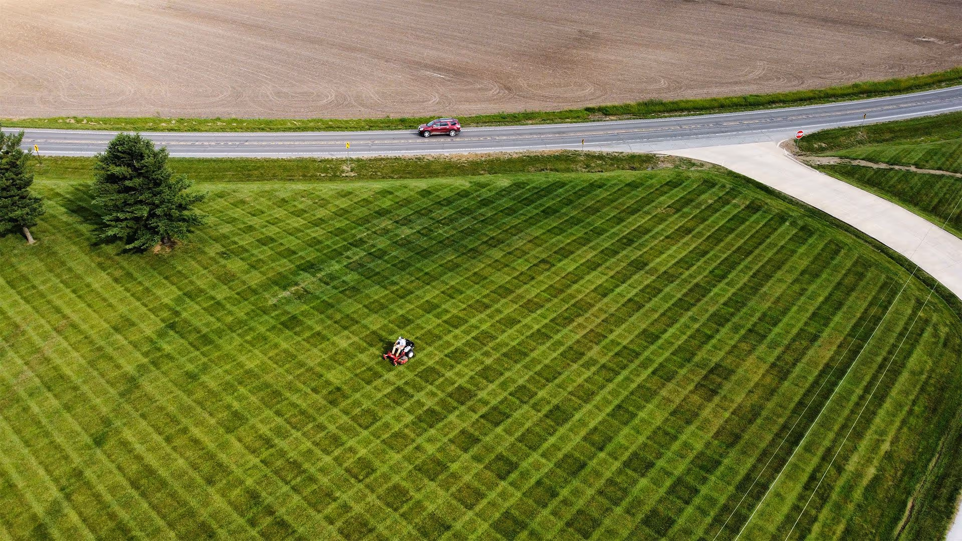 weekly lawn mowing and edging service near me by Landmark Lawncare