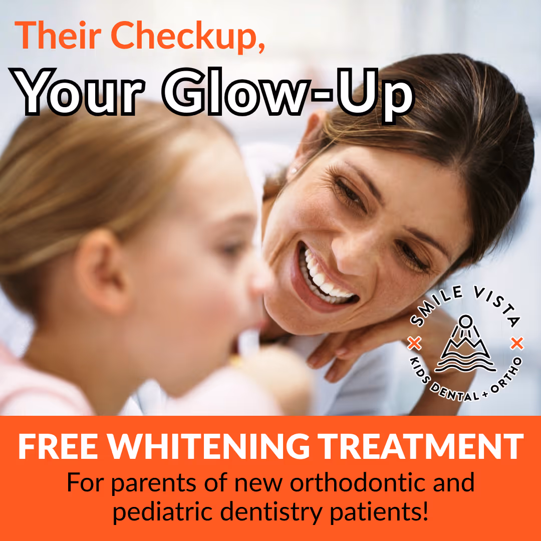 Smiling dentist looking at child with text offering free whitening for new orthodontic dental patients.