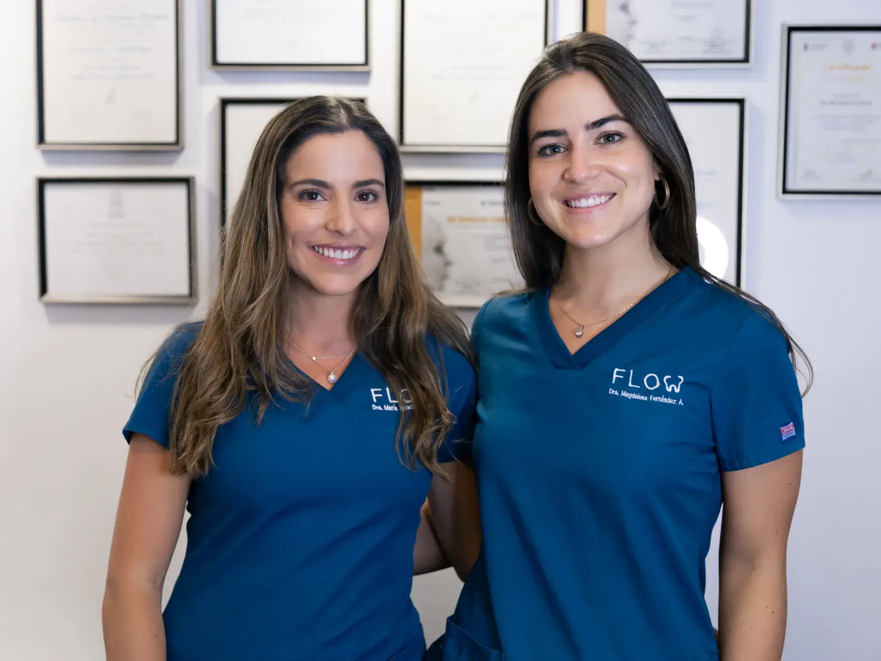 a couple of women standing next to each other