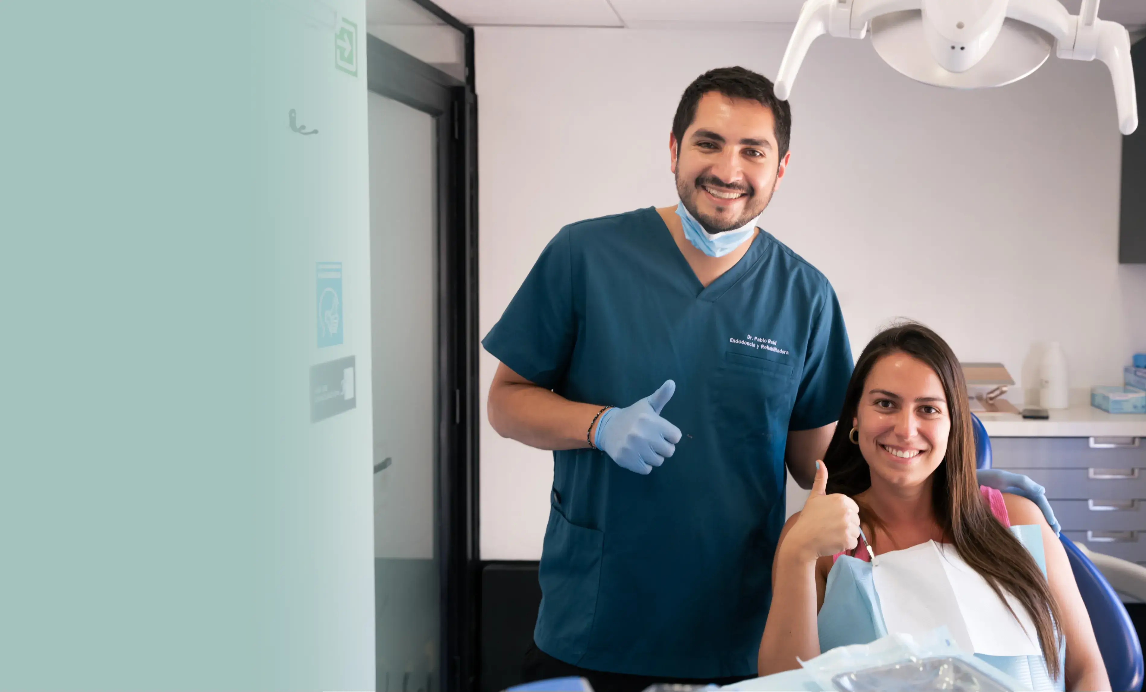 a man and a woman in a dentist's office