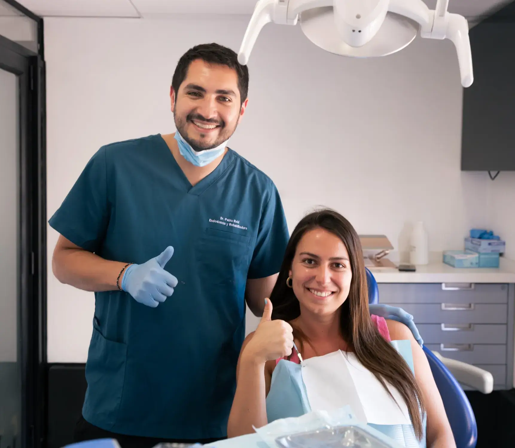 a man and a woman in a dentist's office