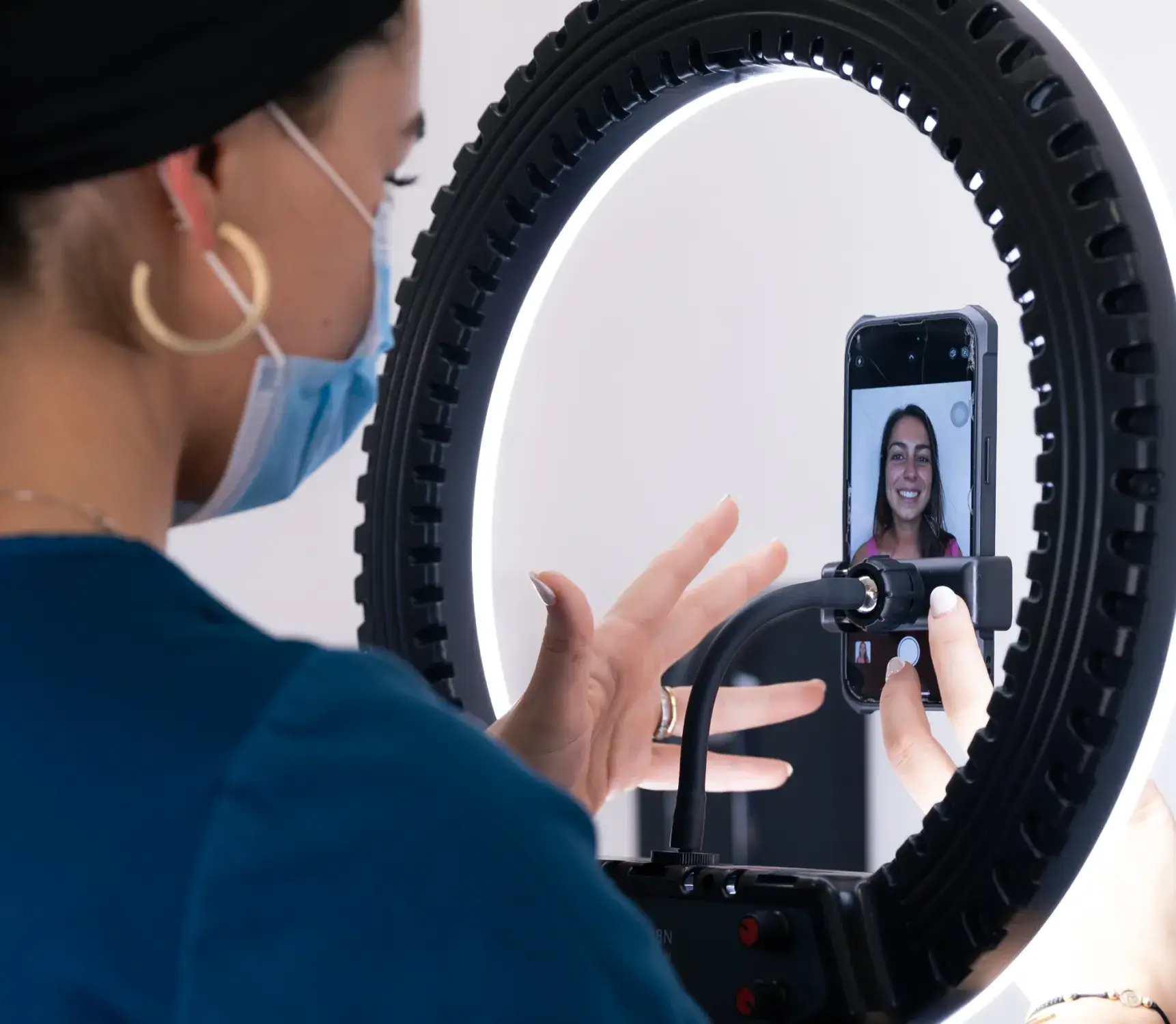 Woman recording herself on the cellphone