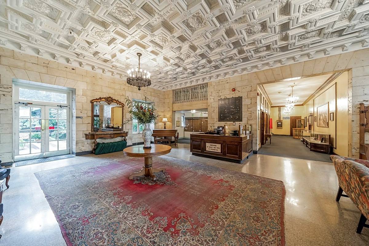 Lobby with view of front desk and rug