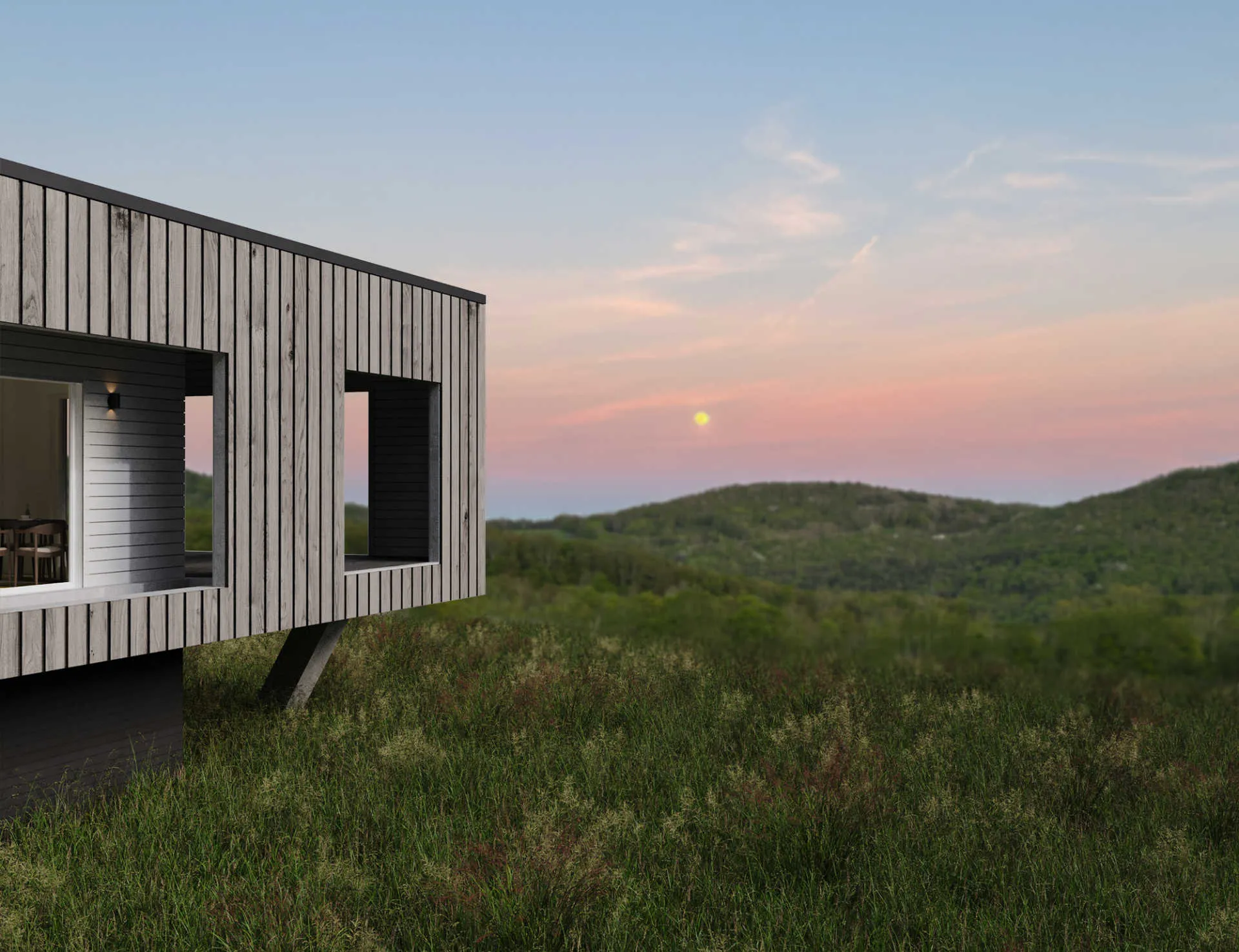 Modern wooden house overlooking a green landscape at sunset with a pastel sky.