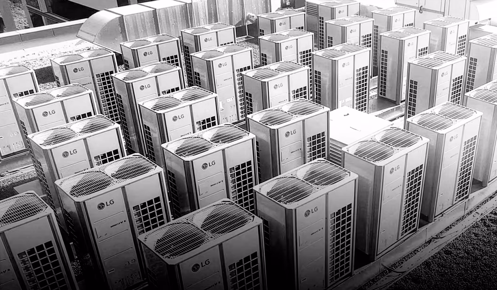 Multiple LG outdoor HVAC units arranged in rows on a rooftop.