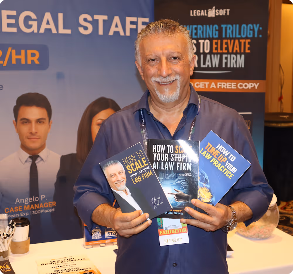 Hamid Kohan with his Law Firm's Books