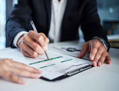 Financial advisor going over finances with retiree