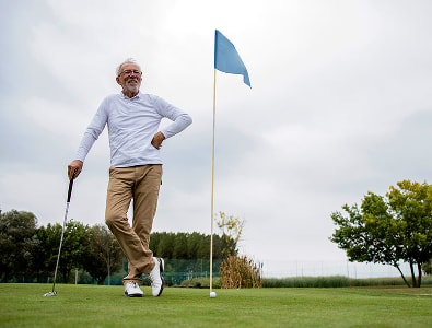 Retiree on a putting green