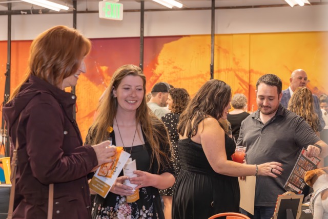 People smile and laugh at the TEEFS launch event. Studio 37 Photography | Lora Bong 