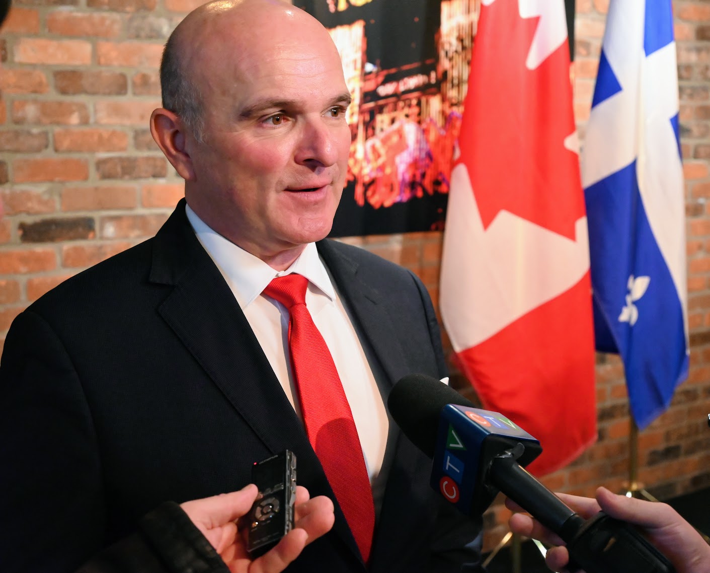 image of handshake over a financial report