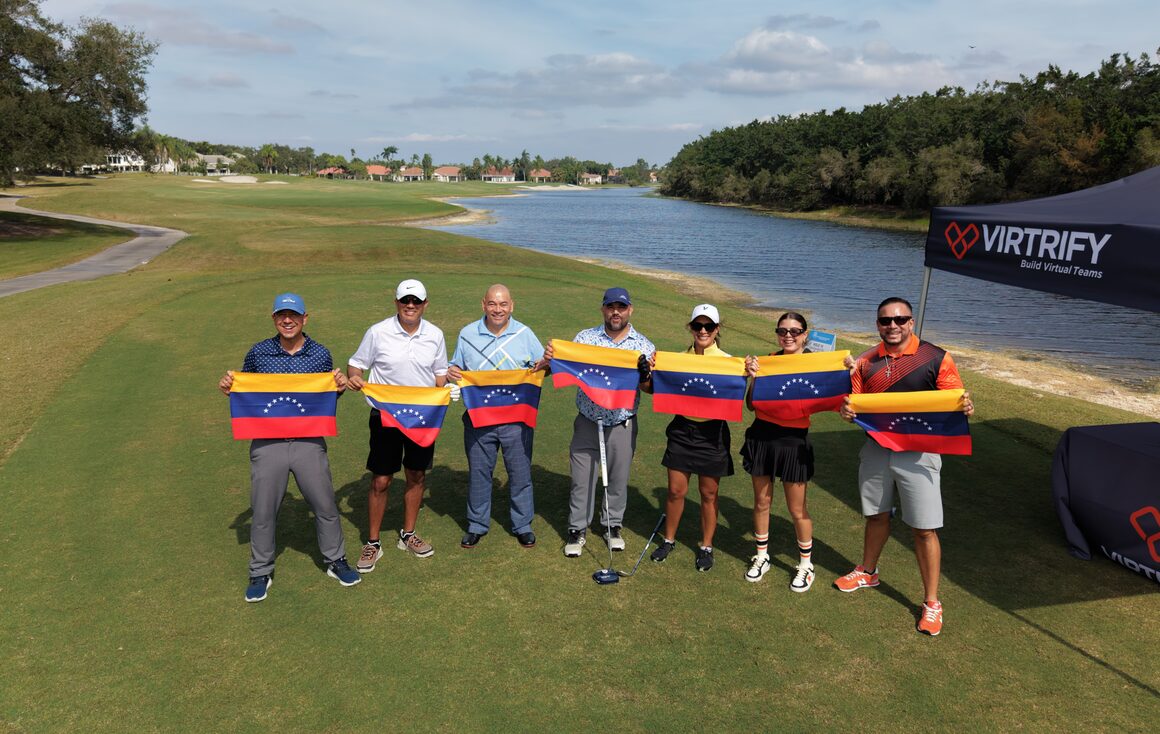 Venezuelan flags on the course at the 2025 charity golf tournament.