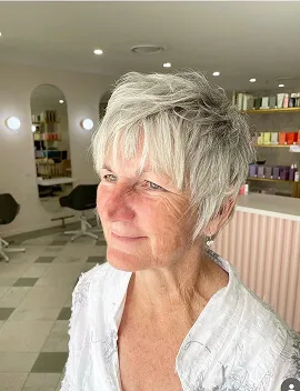 Textured silver pixie haircut with soft wispy layers by Jura Draco Gold Coast hairdresser