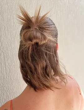 Casual half-up bun event hairstyle on medium-length hair by Jura Draco Gold Coast