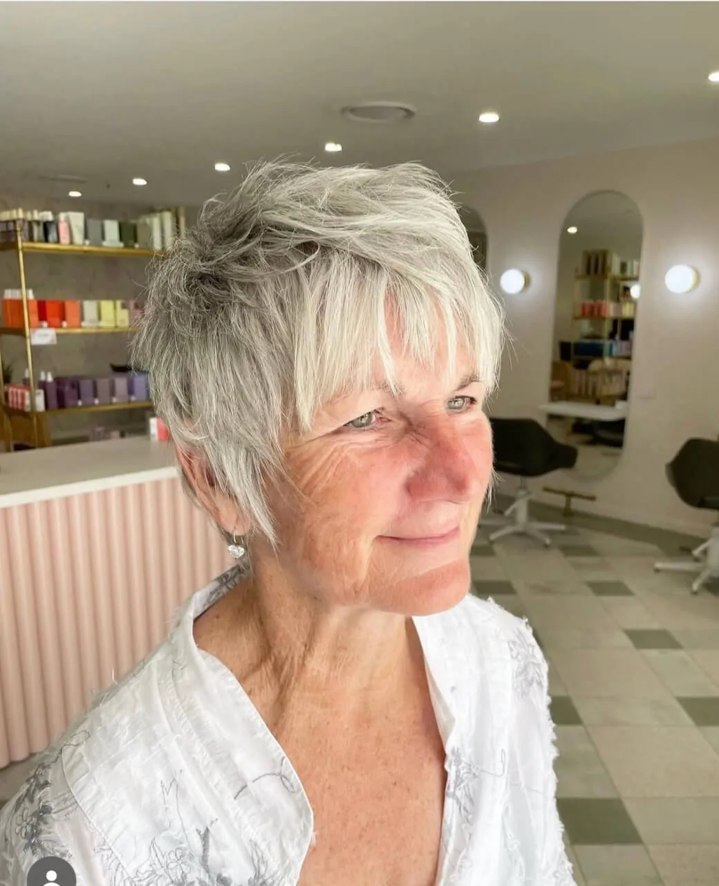 Silver pixie cut with textured layers styled at Jura Draco Gold Coast hair salon