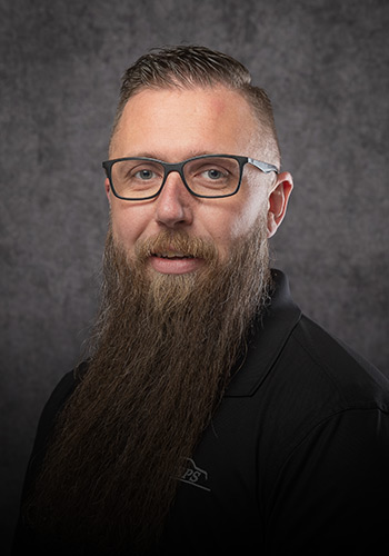 Professional headshot of K-ceps own Jon Minor, General Manager.