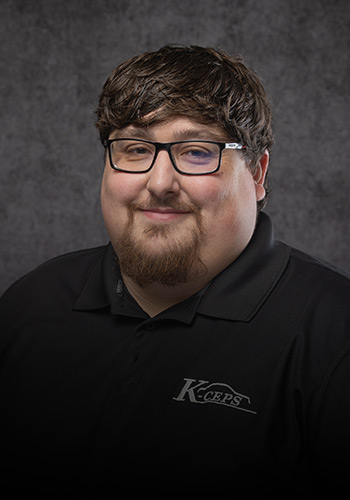Professional headshot of K-ceps Scott Meacham, Assistant General Manager.