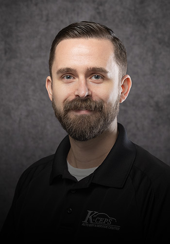Professional headshot of K-ceps own Garrick Daniels, Repair Plan Manager.